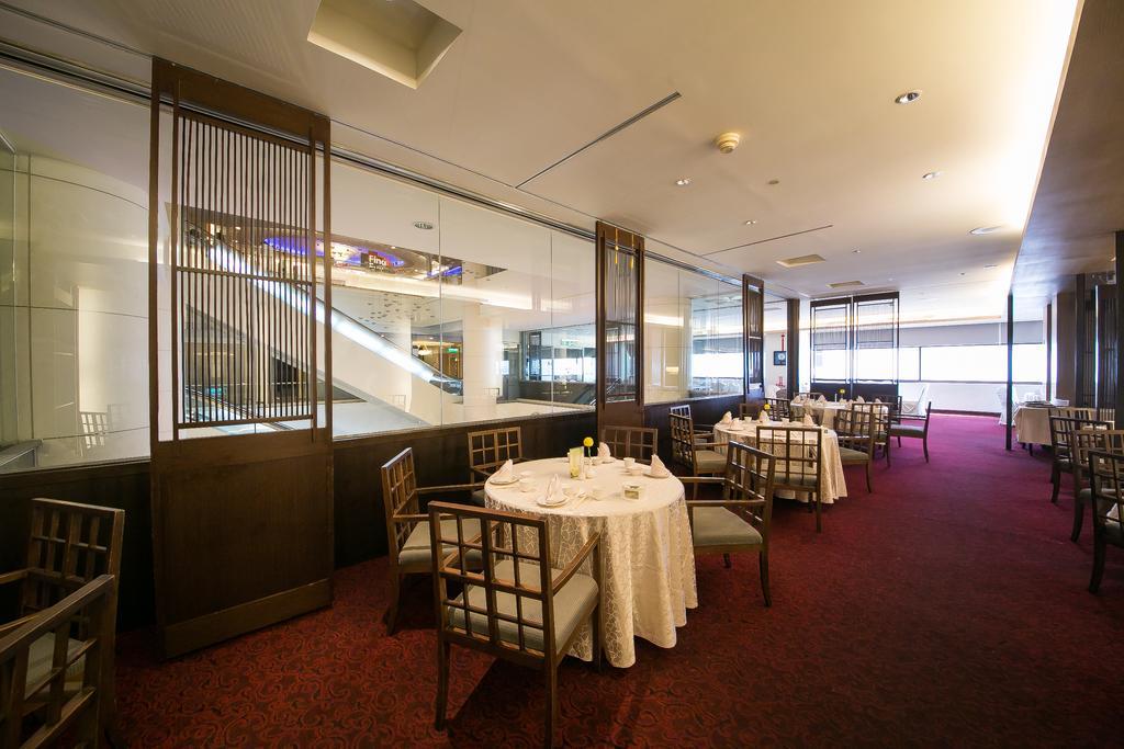 Evergreen Plaza Hotel - Tajnan Kültér fotó The interior of the restaurant