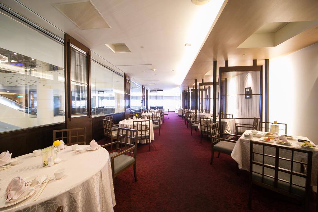 Evergreen Plaza Hotel - Tajnan Kültér fotó Interior of the restaurant