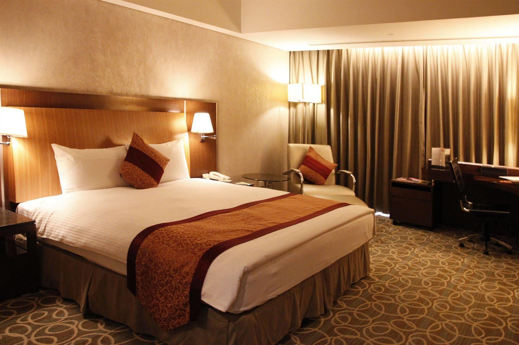 Evergreen Plaza Hotel - Tajnan Kültér fotó Deluxe room