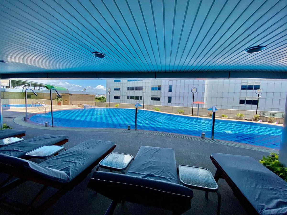 Evergreen Plaza Hotel - Tajnan Kültér fotó Swimming pool at the University of the Sunshine Coast